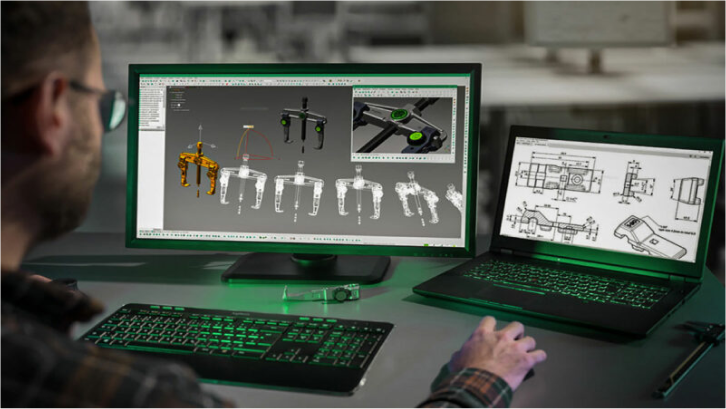 Mann am Computer Ein Mann sitzt am Computer und erstellt Werkzeuge grafisch